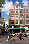 Amsterdam street cafe near Spui , bicycles