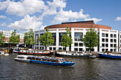 Amsterdam opera house canal boat