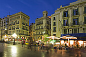 Barcelona,Las Ramblas,dusk,tourists,street cafe at night