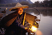 Cormorant fisherman on the Li River. Chuang Autonomous Region of Kwangsi (Guangxi). China