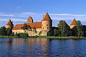 Gothic castle (XIV-XVth century). Lake Galve, Trakai. Lithuania.