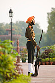 Indian Gate Memorial Arch & Sikh Soldier Guard. Central Delhi. Delhi. India.