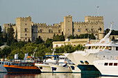 Palace of the Grand Masters (14th century) from Mandraki Harbor. Morning. Rhodes. Dodecanese, Greece