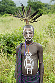 Make-up. Surma child. Near Kibish. Ethiopia.