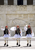 Changing of the Guard, soldiers (Evzones) in front of the Monument to the Unknown Soldier, Syntagma Square. Athens. Greece