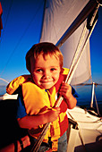 Boy sailing on Great Salt Lake. Utah. USA