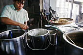 Busy teashop kitchen. Mandalay. Myanmar.