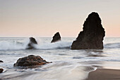 Sunset over sea stacks at Rodeo Cove, Golden Gate NRA, Marin Headlands, San Francisco, California, USA