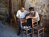 Men drinking tea and talking. Bodrum. Turkey.