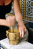 Making sauce. Riad Maison Bleue. Fes. Morocco.