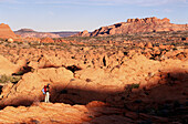 Hiking. Coyote Buttes, Paria Wilderness. Arizona. USA.