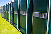 line of portable toilets