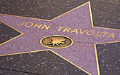 John Travolta s star at Hollywood s walk of fame. Hollywood Boulevard. Hollywood, Los Angeles. California. USA
