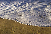 White water and beach sand