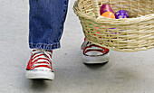 Boy walking with Easter egg basket