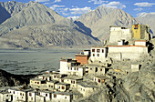  Architecture, Asia, Buddhism, Building, Buildings, Color, Colour, Daytime, Diskit Gompa, Exterior, Horizontal, India, Jammu and Kashmir, Ladakh, Monasteries, Monastery, Mountain, Mountain range, Mountains, Nubra, Outdoor, Outdoors, Outside, Religion, Tra