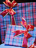 Christmas presents with bows and ribbons.