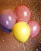 Color: party balloons & confetti.