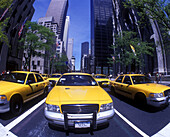 Street scene, Taxi cabs, Fifth Avenue, Manhattan, New York, USA.