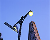 Street scene, Broadway sign, Flatiron building, Manhattan, New York, USA.