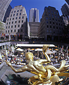 Street scene, Cafes, Prometheus fountain, Rockefeller center, Manhattan, New York, USA.