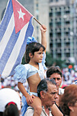 Little girl waving cuban flag at parade. Cuba