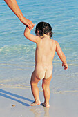 Nude child at the beach