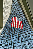 US flag hanging in the atrium of the John Fitzgerald Kennedy Library, Dorchester. Massachusetts, USA
