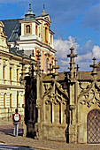 Gothic Stone Fountain and St. John of Nepomuk Church. Kutna Hora. Czech Republic.