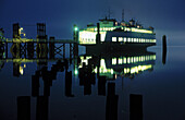 Evergreen State Ferry at dock before dawn in fog. Anacortes, Washington. USA