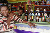Black female, bar, rum, liqueur. Dutch. Philipsburg. Great Bay. Sint Maarten.