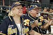 Riverwalk Stadium, Biscuit Baseball, AA Minor League, fan, couple, cheer. Montgomery. Alabama. USA.