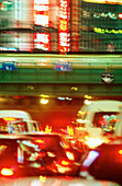 Traffic under moving train. Shinjuku. Tokyo. Japan