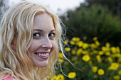 Young woman smiles brightly, California