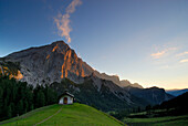 Chapel near alpine hut Hallerangeralm with mount Lafatscher in sunset light, Hinterau valley, Karwendel range, Tyrol, Austria