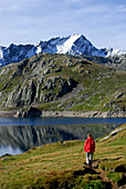 Woman hiking at Lago del Naret, Canton of Ticino, Switzerland
