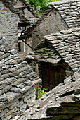 View over stone roofs several Rustici, Brione, Valle Verzasca, Canton of Ticino, Switzerland