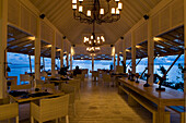 Blu restaurant in the evening light, Four Seasons Resort Landaa Giraavaru, Maldives