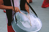 Playing steel pan during carnival. Trinidad and Tobago