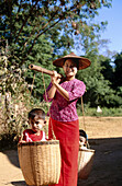 Woman with children. Inden village. Inle Lake. Shan State. Myanmar.