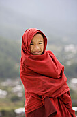 Bhutan. Buthang Valley. Jankar. Tashing Goemba Monastery. Little Buddhist monk.