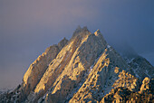 Dawn light on Lone Pine Peak, Inyo NF. Sierra Nevada Mountains, California. USA