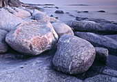Round stones at the coastline. Halland, Sweden, Scandinavia, Europe.