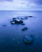 Stones in water edge. Kattegatt Sea. Skåne. Sweden. Scandinavia
