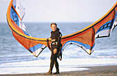 Kite surfer or kite sailor.