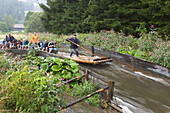 Rafting on Wilde Rodach near Wallenfels, Frankenwald, Franconia, Germany