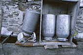 Empty milk cans. South Tyrol. Italy
