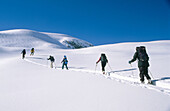 Skiers in McGregor Range in British Columbia. Canada