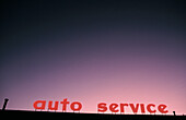 Auto Service sign at dawn/dusk