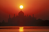 Taj Mahal at dawn, from Jumna riverbank. Agra. India